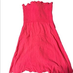 Hot pink bathing suit cover.